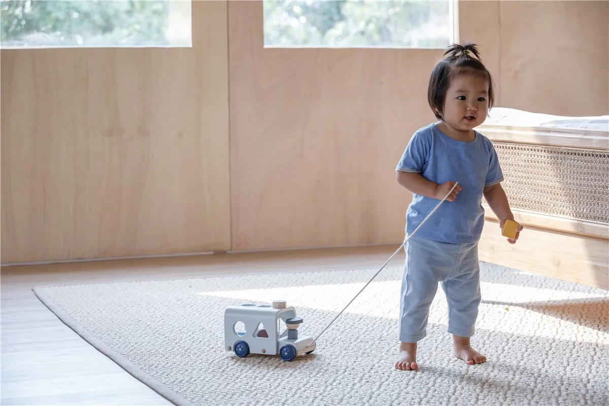 Autobús Escolar Encajable Orchard Plantoys - Imagen 6